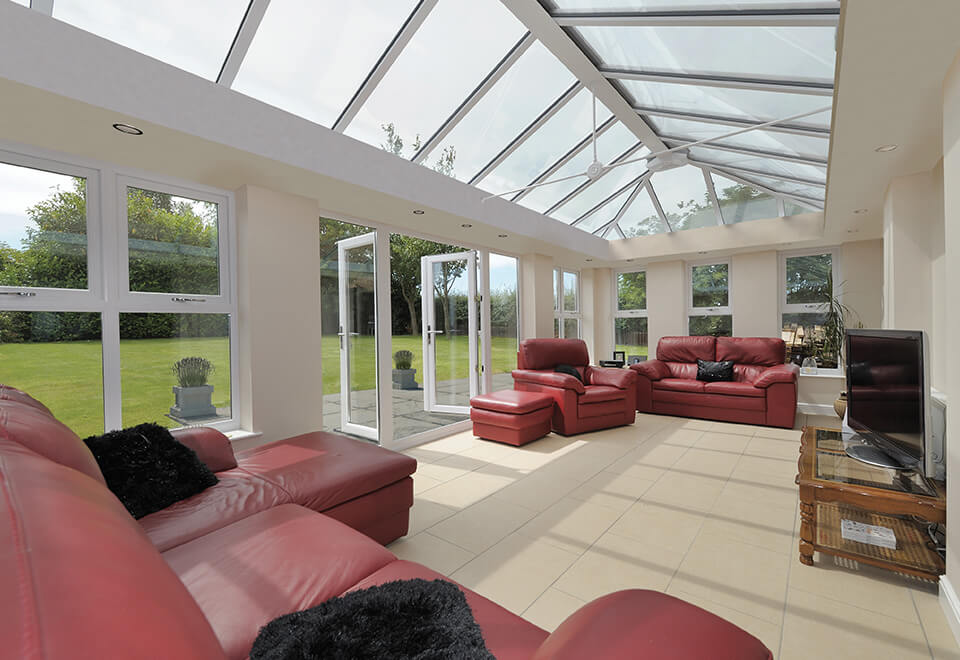 Large white uPVC orangery interior view